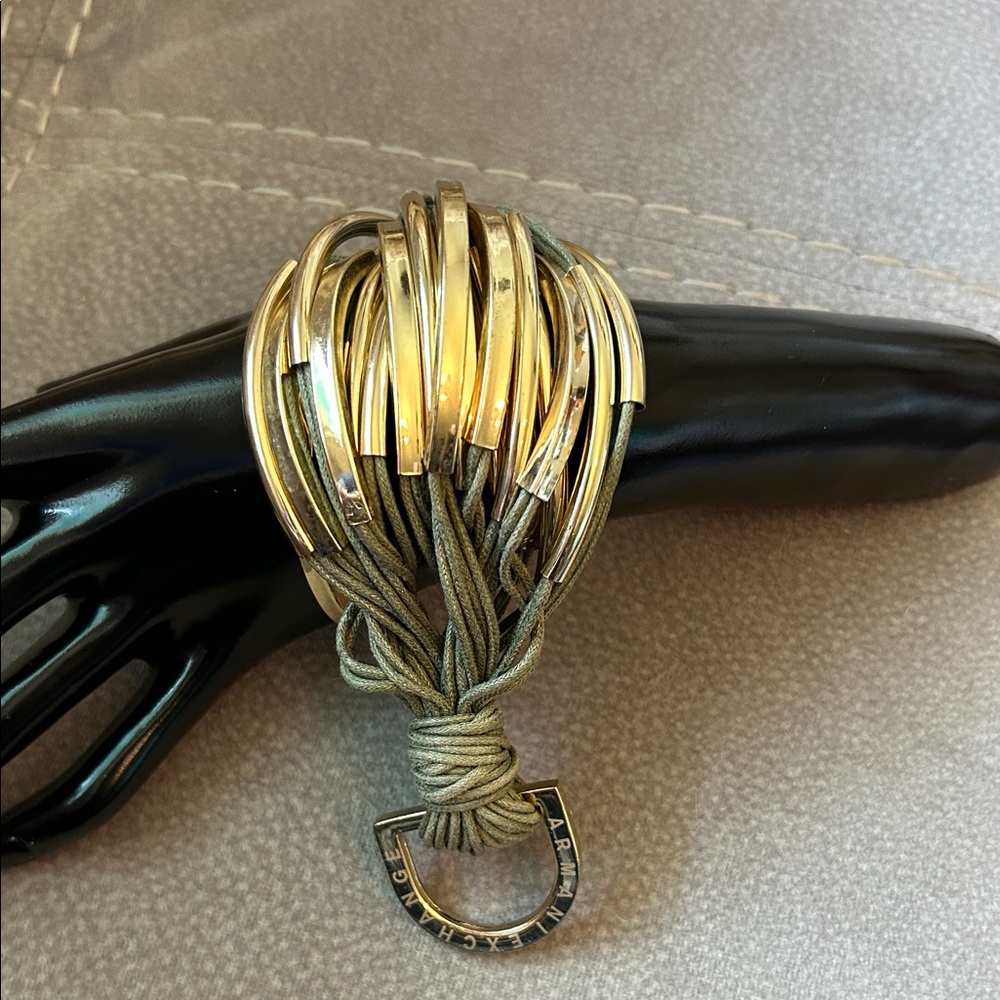 VINTAGE ARMANI EXCHANGE BRACELET LEATHER AND GOLD TONE METAL ARCH SHAPED .